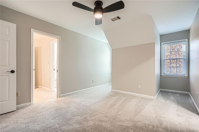 interior space with vaulted ceiling and ceiling fan