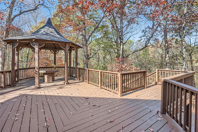 wooden deck featuring a gazebo