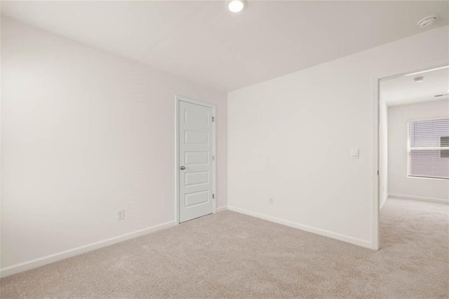 12086 Conrad Cir, Hampton, GA 30228 - carpeted empty room featuring baseboards, a smoke detector, and recessed lighting