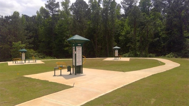 12086 Conrad Cir, Hampton, GA 30228 - view of property's community with a lawn