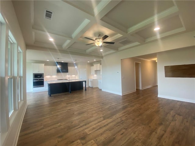 226 Montview Dr, Jefferson, GA 30549 - unfurnished living room featuring coffered ceiling, dark wood-style floors, beam ceiling, baseboards, and a ceiling fan