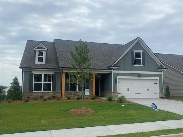 226 Montview Dr, Jefferson, GA 30549 - craftsman-style house featuring stone siding, a shingled roof, concrete driveway, and a front yard