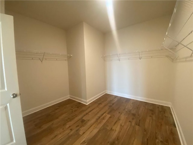 226 Montview Dr, Jefferson, GA 30549 - spacious closet featuring dark wood-style floors