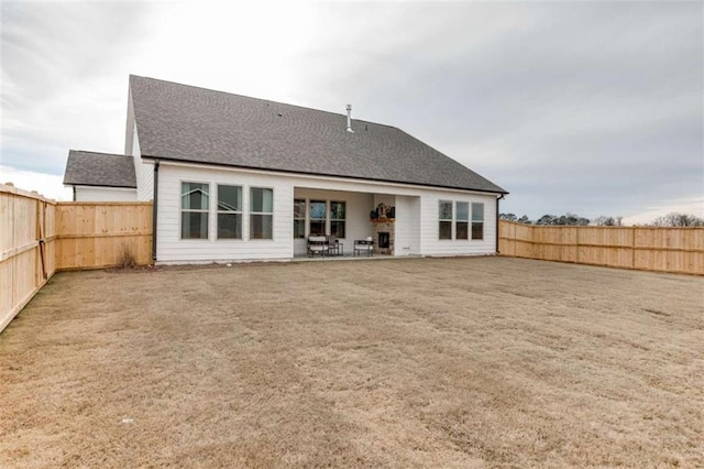 rear view of property with a patio