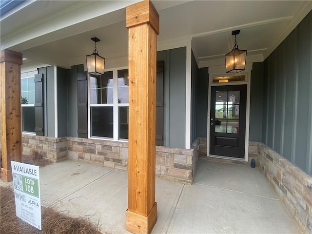 226 Montview Dr, Jefferson, GA 30549 - property entrance with a porch and stone siding