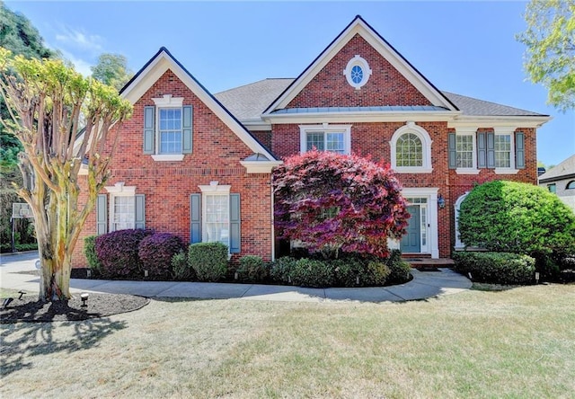 870 Longstone Lndg, Alpharetta, GA 30022 - view of front of home with a front lawn and brick siding