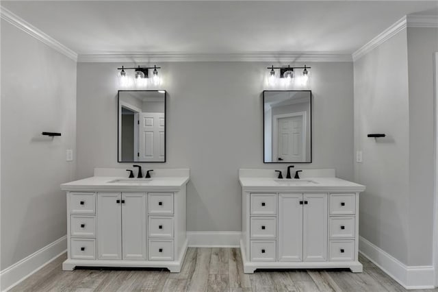 870 Longstone Lndg, Alpharetta, GA 30022 - full bathroom with two vanities, wood finished floors, and ornamental molding