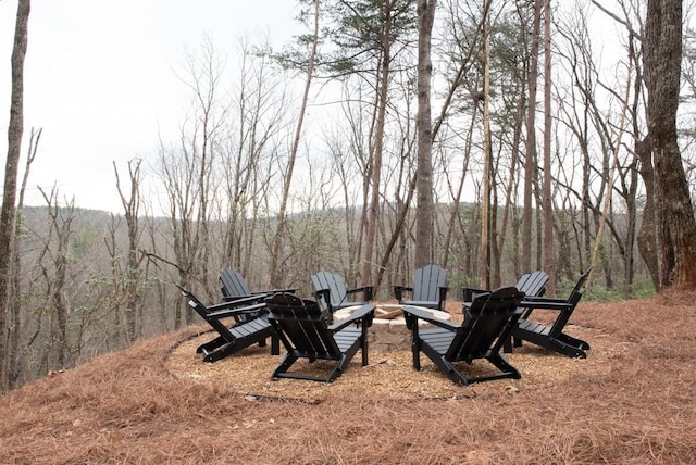 6 Huntington Pl, Dahlonega, GA 30533 - view of yard with an outdoor fire pit and a forest view