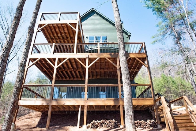 6 Huntington Pl, Dahlonega, GA 30533 - rear view of house featuring a deck and stairway