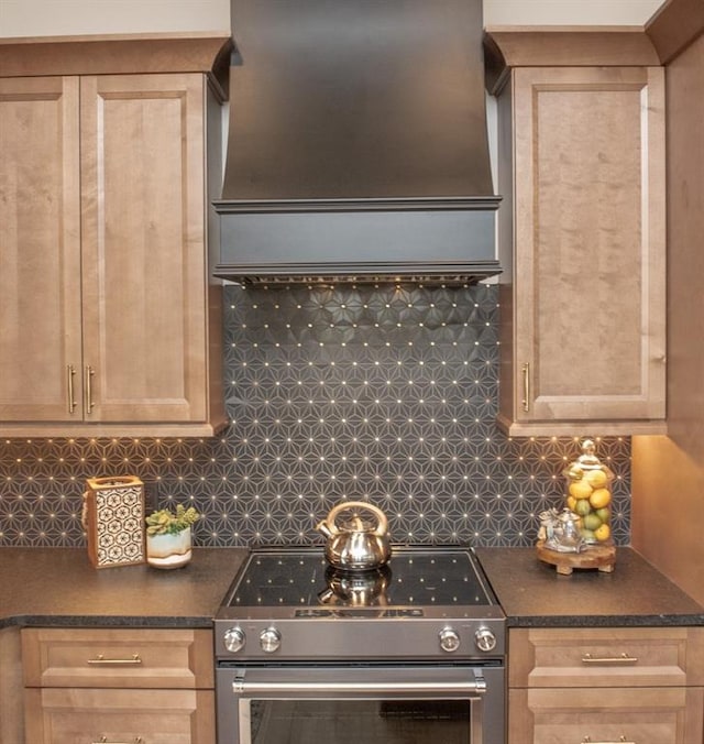 6 Huntington Pl, Dahlonega, GA 30533 - kitchen with stainless steel electric stove, premium range hood, dark countertops, and tasteful backsplash