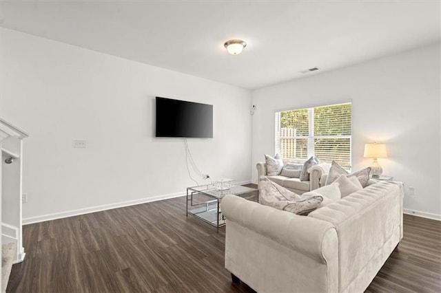 living room featuring dark hardwood / wood-style floors