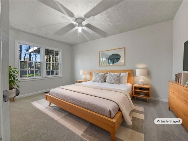 bedroom with sink, ensuite bath, ceiling fan, wood-type flooring, and a closet