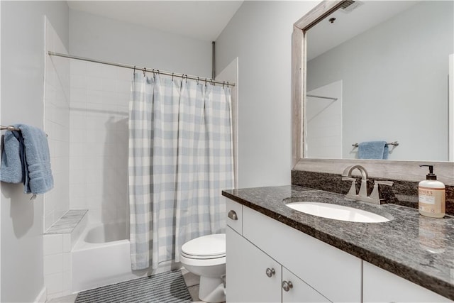 full bathroom featuring toilet, vanity, and shower / bathtub combination with curtain