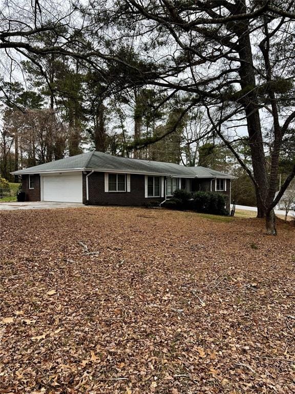 single story home with a garage