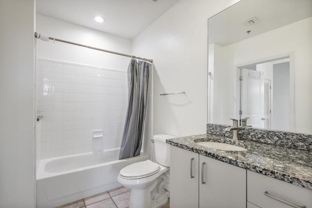 943 Peachtree St NE Unit 716, Atlanta, GA 30309 - bathroom featuring toilet, vanity, shower / bath combination with curtain, and tile patterned flooring