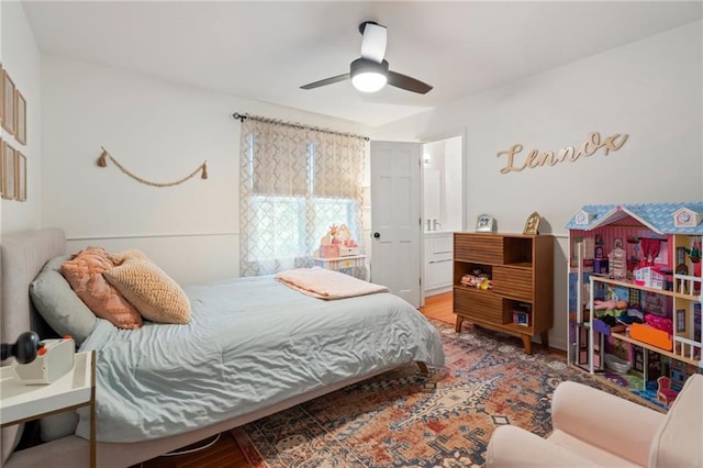 bedroom with hardwood / wood-style floors and ceiling fan