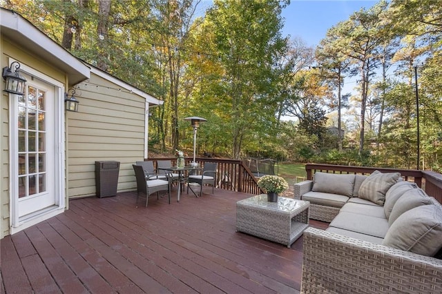 deck featuring outdoor lounge area