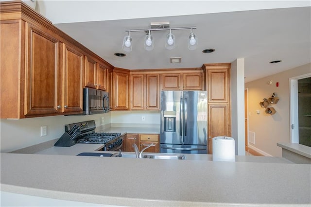 kitchen featuring sink and appliances with stainless steel finishes