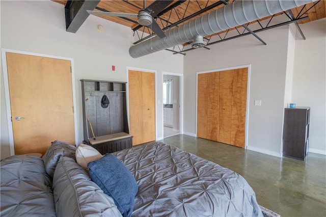 bedroom featuring concrete floors and ceiling fan