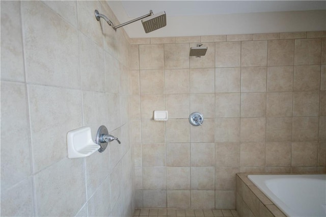 bathroom featuring independent shower and bath