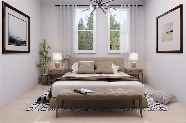 bedroom with a notable chandelier