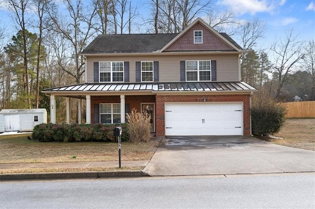 view of front of property featuring a porch and a garage