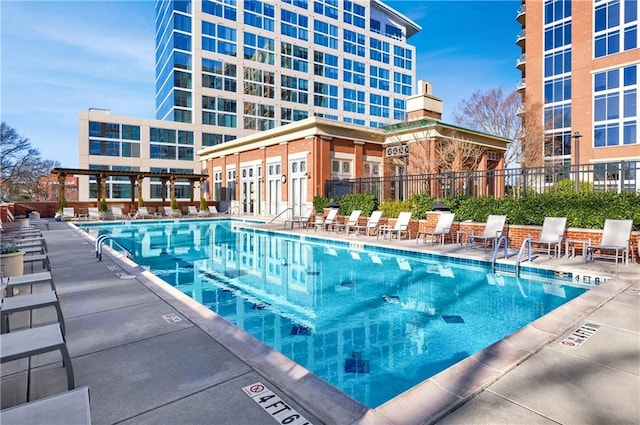 1820 Peachtree St NE Unit 1207, Atlanta, GA 30309 - community pool featuring a patio area