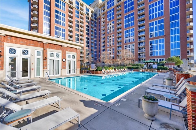 pool featuring a patio area