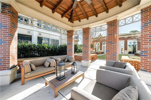 view of patio with a gazebo and outdoor lounge area