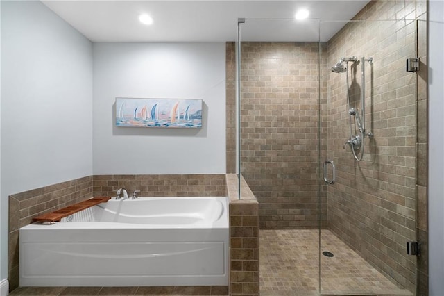 270 17th St NW Unit 2210, Atlanta, GA 30363 - full bath with a stall shower, a bath, tile patterned floors, and recessed lighting