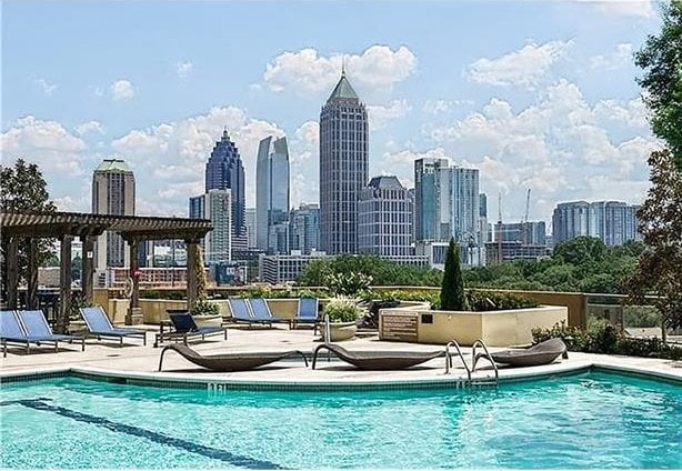 270 17th St NW Unit 2210, Atlanta, GA 30363 - community pool featuring a patio and a view of skyline
