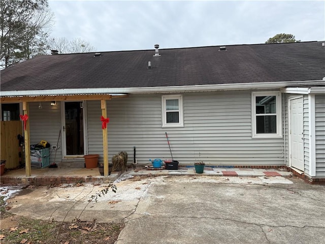 back of property featuring a patio