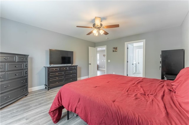 250 Silas Rd, Dahlonega, GA 30533 - bedroom featuring light wood-style floors, baseboards, connected bathroom, and ceiling fan