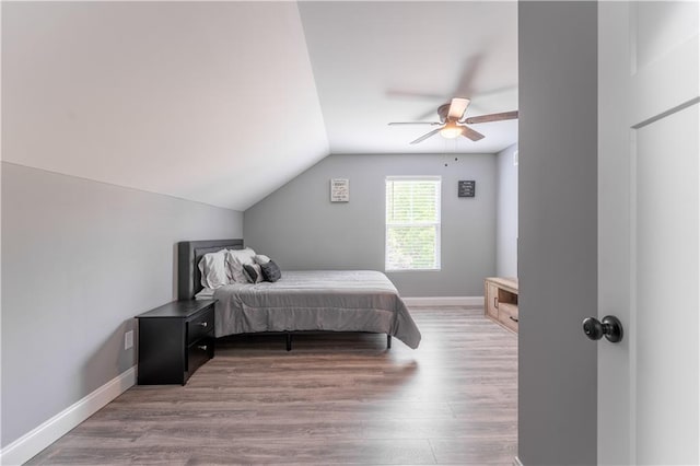 250 Silas Rd, Dahlonega, GA 30533 - bedroom featuring vaulted ceiling, wood finished floors, baseboards, and a ceiling fan