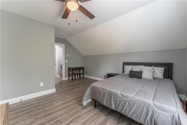 250 Silas Rd, Dahlonega, GA 30533 - bedroom with wood finished floors, baseboards, vaulted ceiling, and ceiling fan