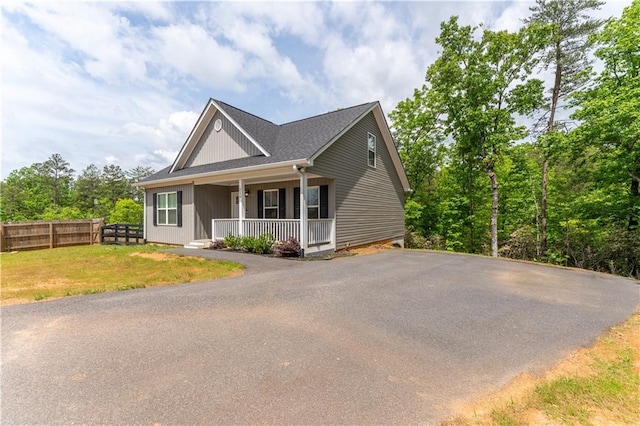 250 Silas Rd, Dahlonega, GA 30533 - view of front of home with a porch, fence, and asphalt driveway