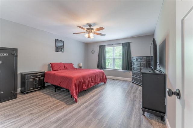 250 Silas Rd, Dahlonega, GA 30533 - bedroom featuring light wood-type flooring, baseboards, and a ceiling fan