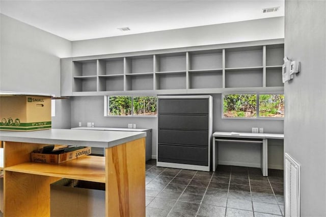 kitchen with visible vents and light countertops