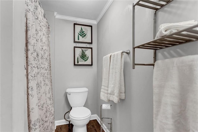 4481 Mclain Cir, Acworth, GA 30101 - full bath with wood finished floors, baseboards, curtained shower, crown molding, and toilet
