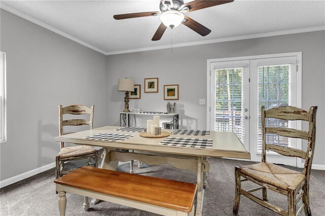 4481 Mclain Cir, Acworth, GA 30101 - carpeted dining room featuring ceiling fan, baseboards, ornamental molding, french doors, and a textured ceiling