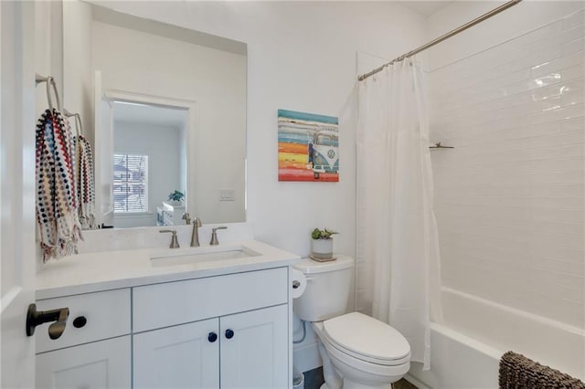 bathroom featuring shower / bath combination with curtain, toilet, and vanity