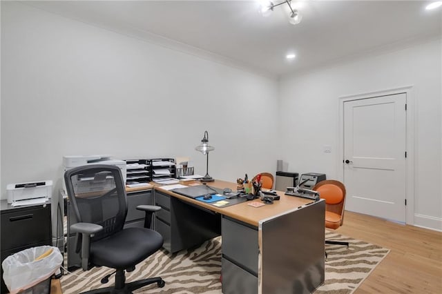office space with crown molding, light wood-style flooring, and recessed lighting