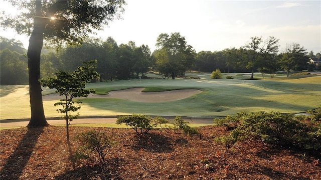 view of property's community featuring view of golf course