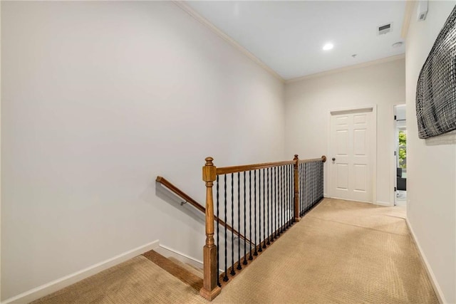 11271 Calypso Dr, Alpharetta, GA 30009 - hallway with an upstairs landing, light colored carpet, crown molding, and recessed lighting