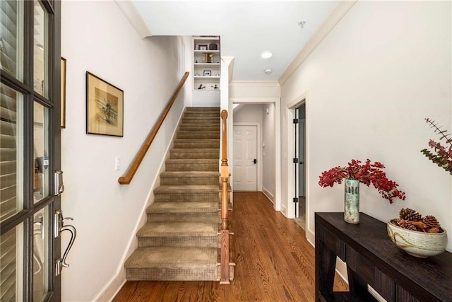 11271 Calypso Dr, Alpharetta, GA 30009 - staircase with wood finished floors and ornamental molding