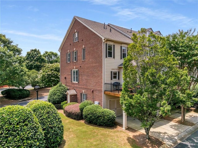 11271 Calypso Dr, Alpharetta, GA 30009 - view of side of home featuring brick siding