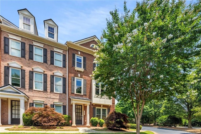 11271 Calypso Dr, Alpharetta, GA 30009 - view of property featuring brick siding