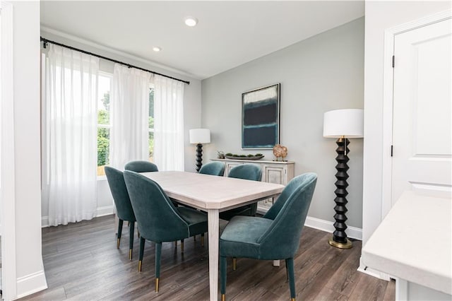 dining space with recessed lighting, wood finished floors, and baseboards