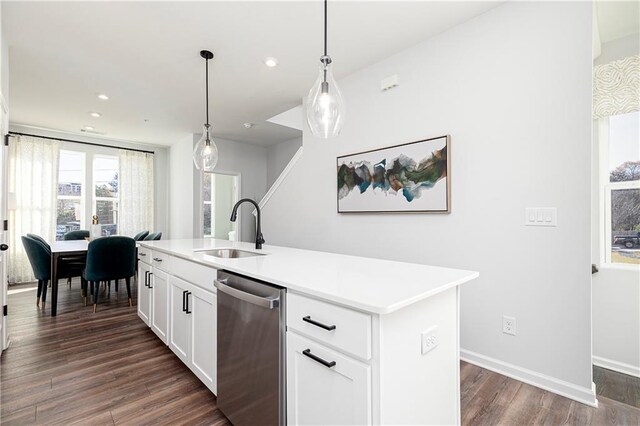 kitchen featuring white cabinets, light stone counters, stainless steel appliances, and decorative backsplash