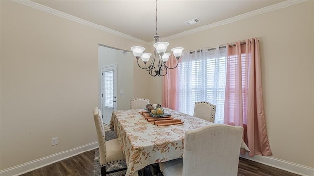 879 Tranquil Way, Hampton, GA 30228 - dining room featuring a chandelier, crown molding, and dark wood finished floors